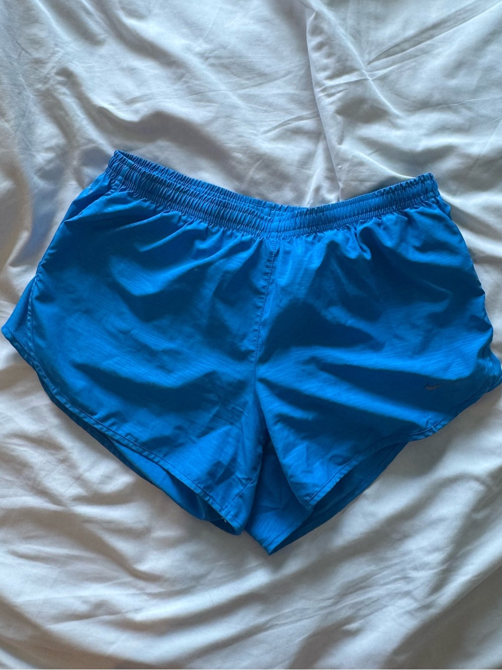 Blue Nike Dri Fit running shorts